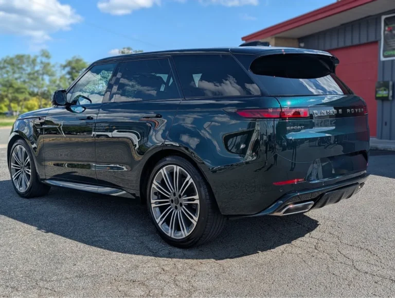 Dark green Range Rover Sport with glossy exterior finish after a full car detailing.